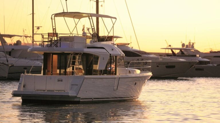 Beneteau Swift Trawler 35 going into dock at sunset